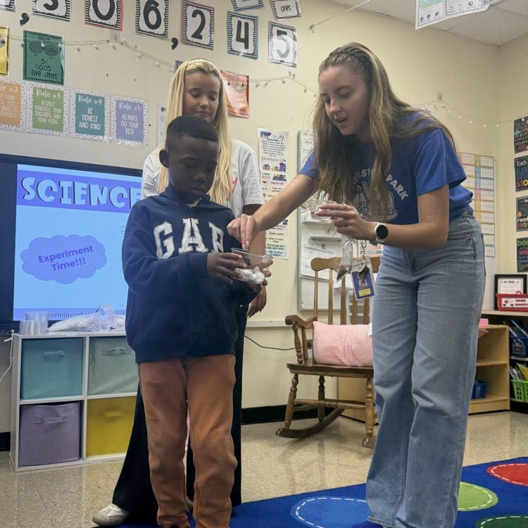 Teacher and Student Demonstrating 