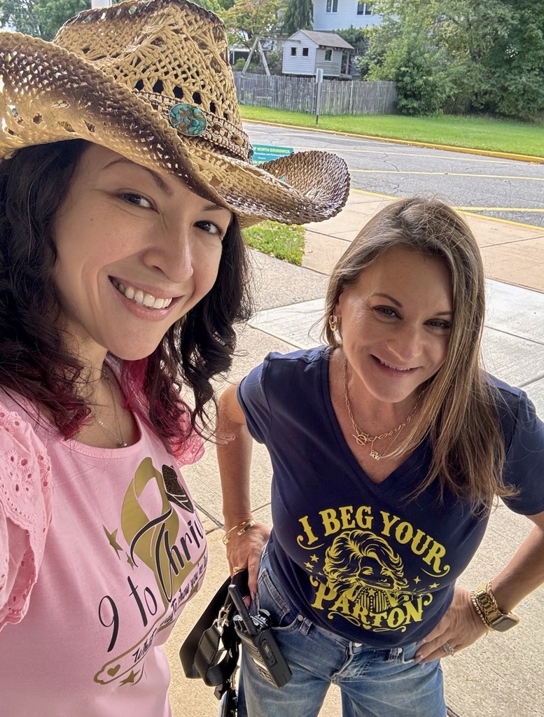 Staff in dolly parton t-shirts