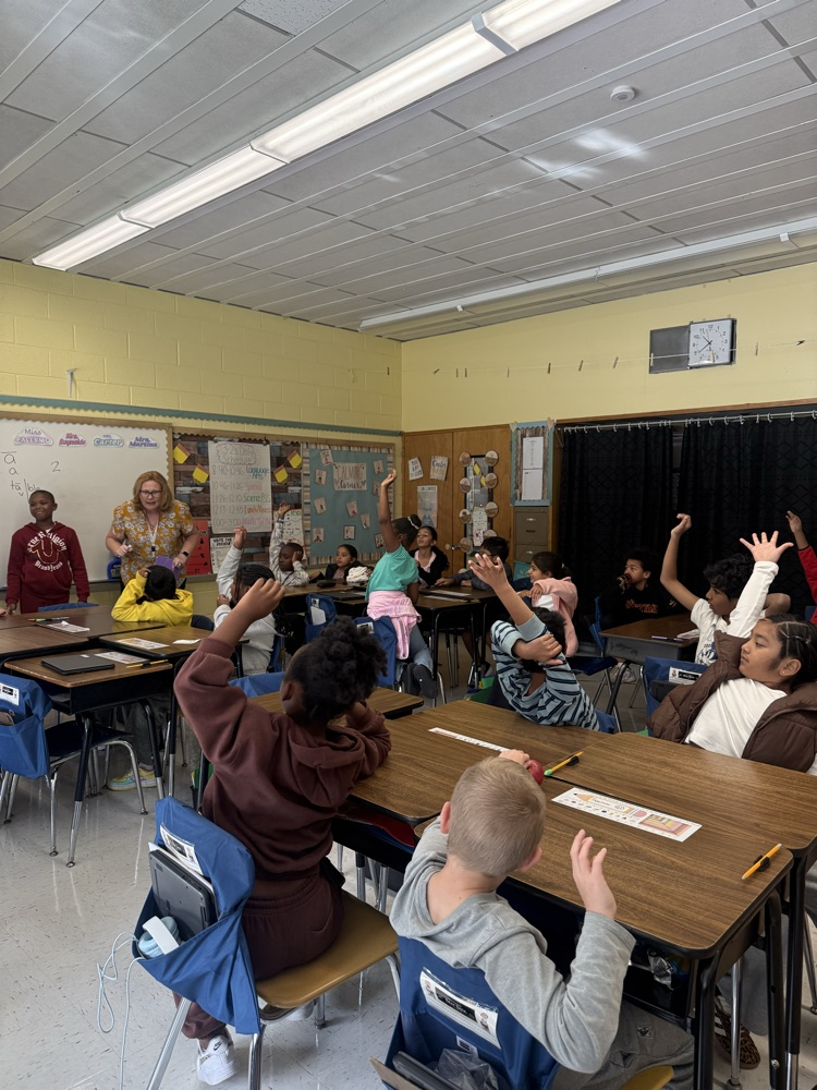 Students acting out Word study vocabulary in a classroom