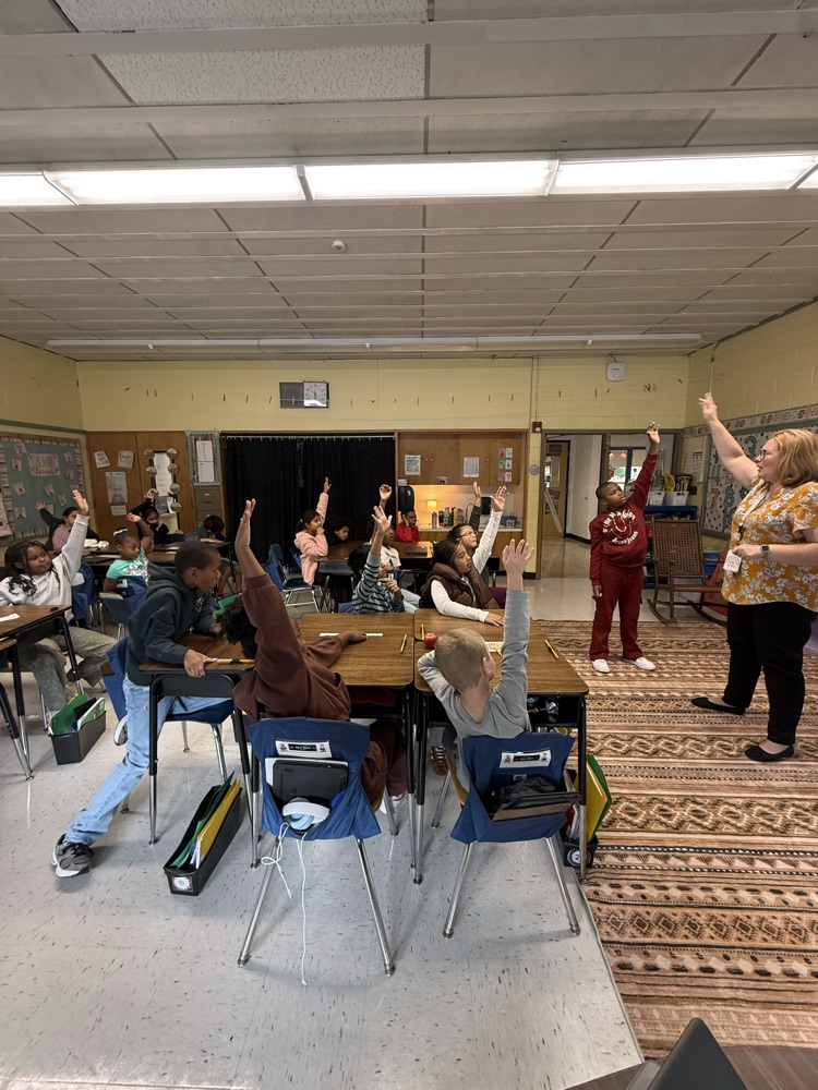 Students acting out Word study vocabulary in a classroom