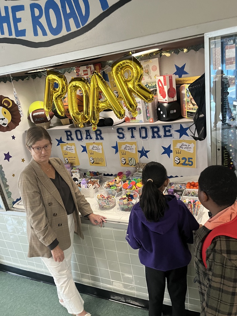 Students buying items from school store