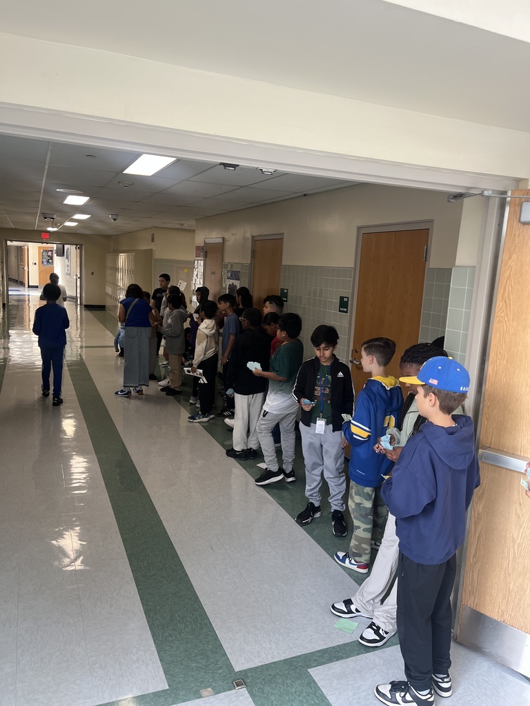 Students lining up in school hallway