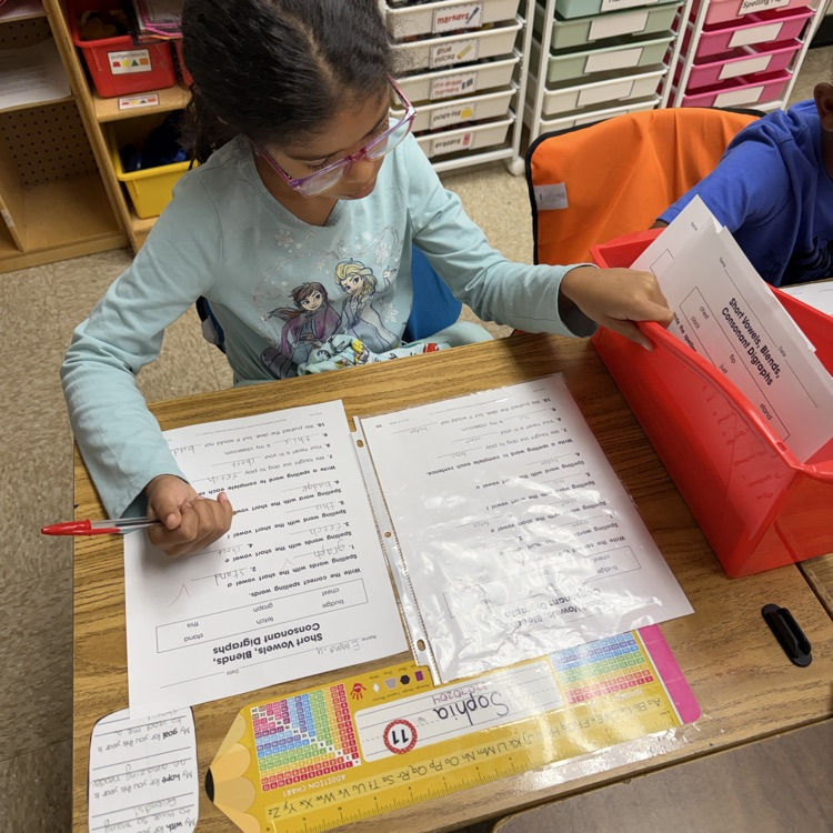 student checking her work 