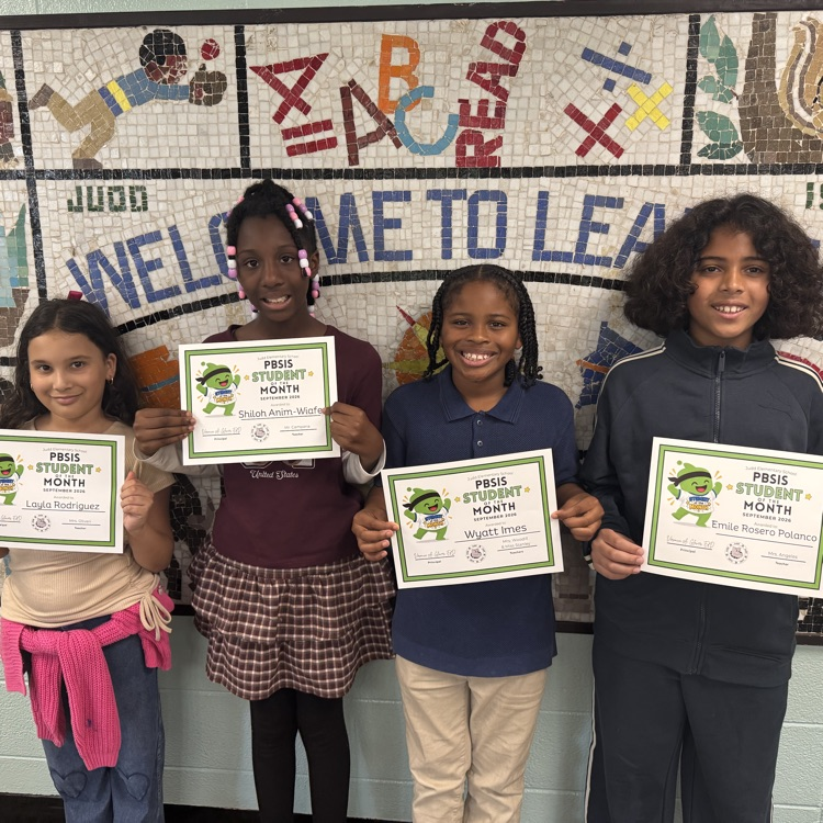 Students holding certificates