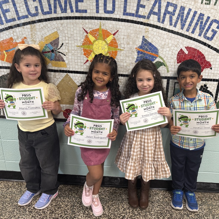 Students holding certificates