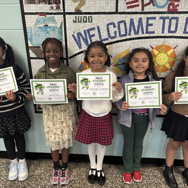 Students holding certificates