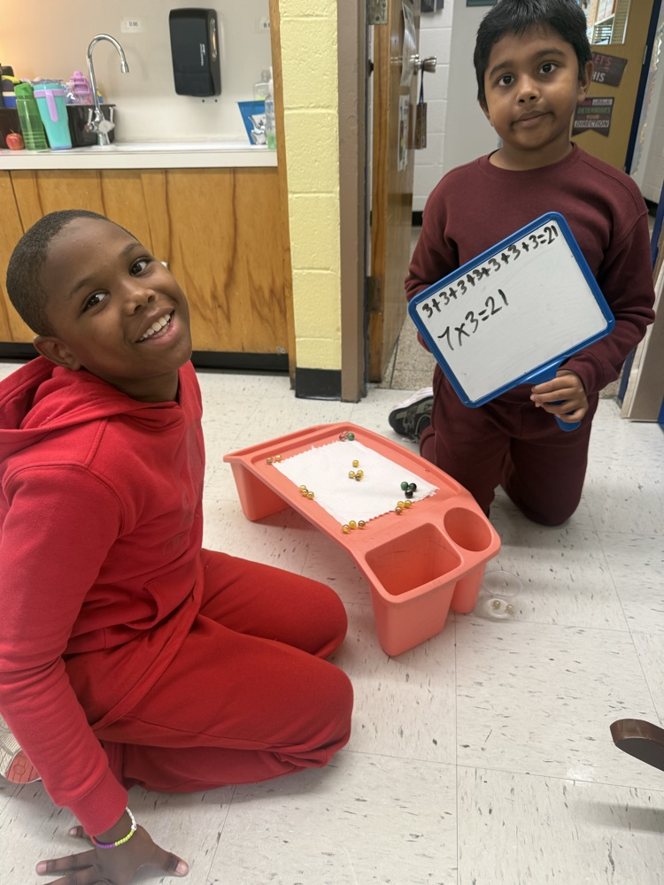 students investigating math by working together