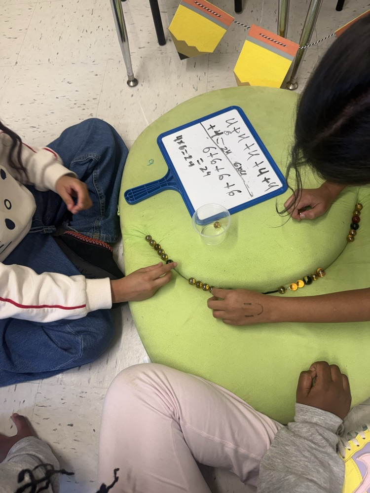 students investigating math by working together