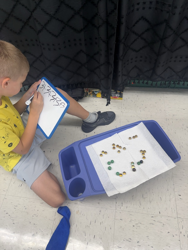 students investigating math by working together