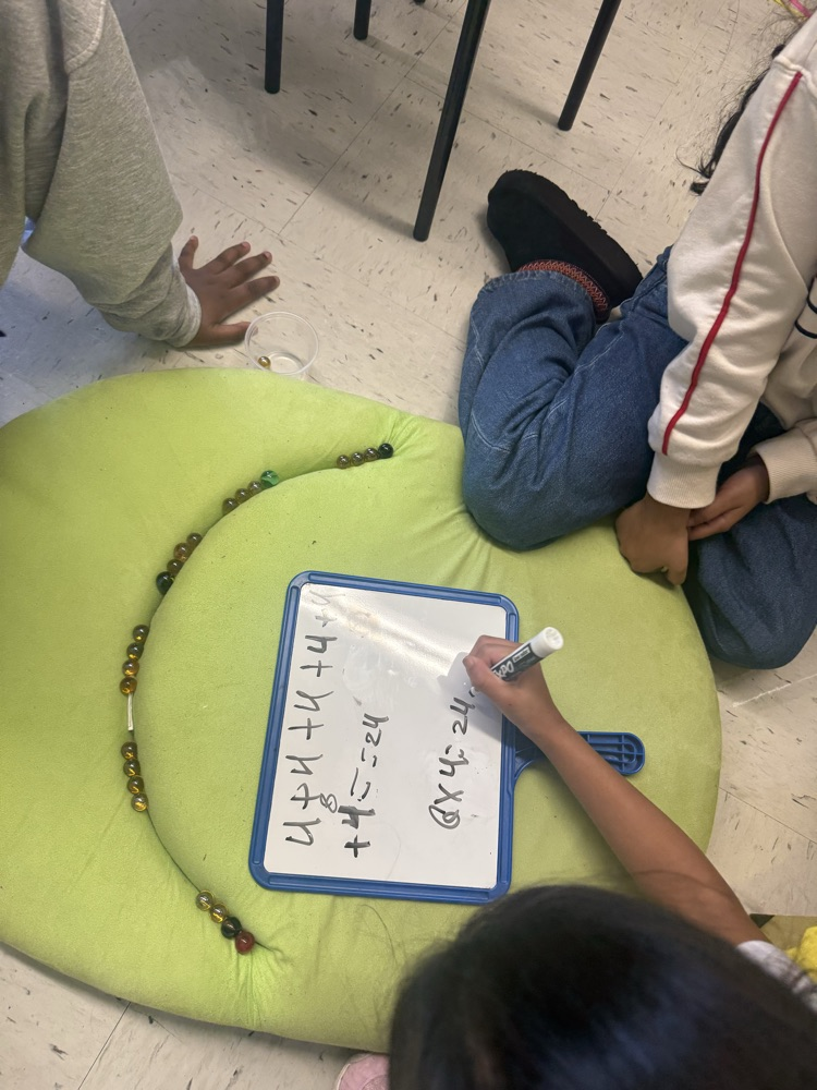 students investigating math by working together