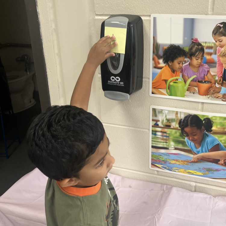 Students finding letters around the room