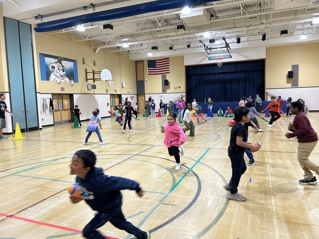 Kids playing ball in the gymnasium
