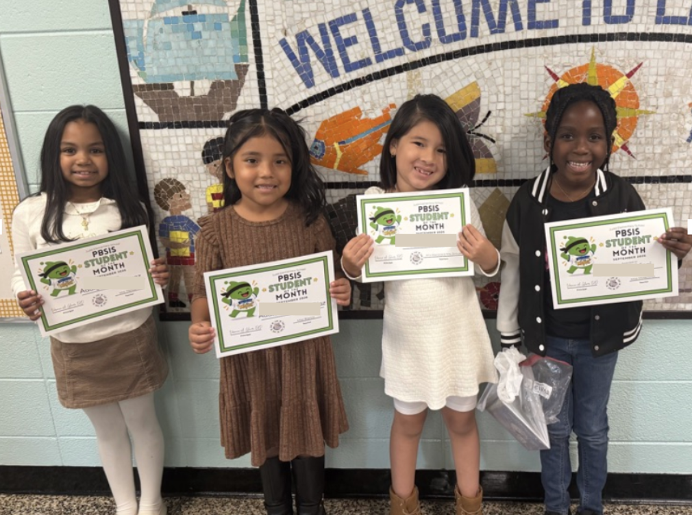 Students holding certificates