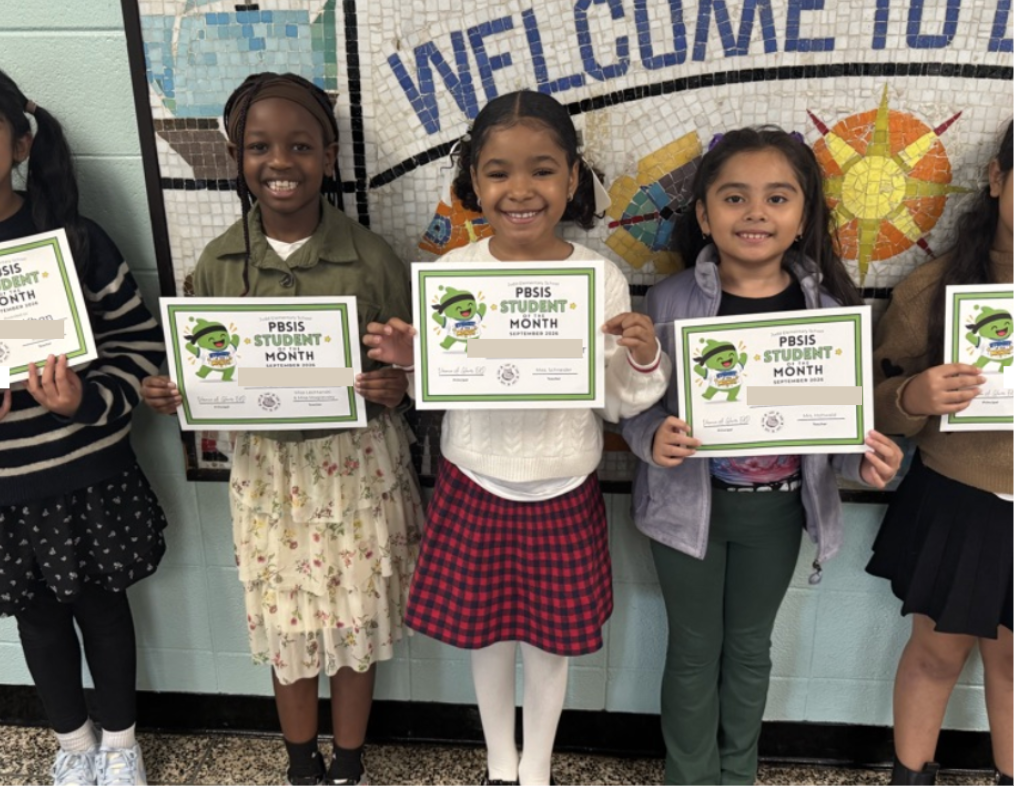 Students holding certificates