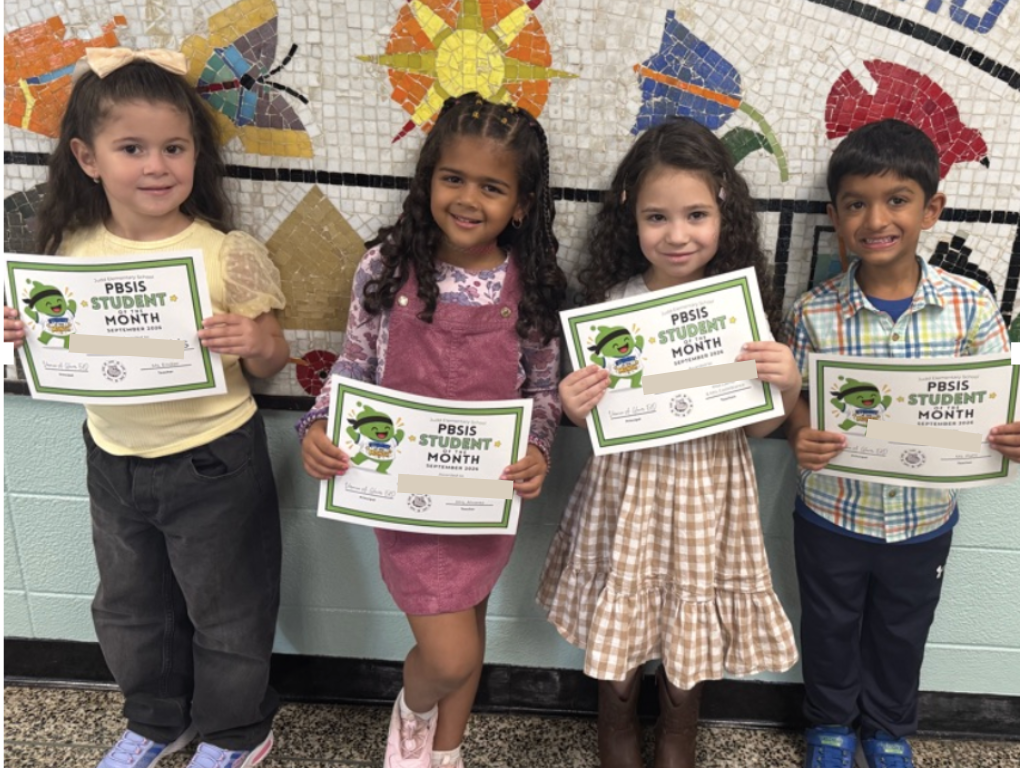 Students holding certificates