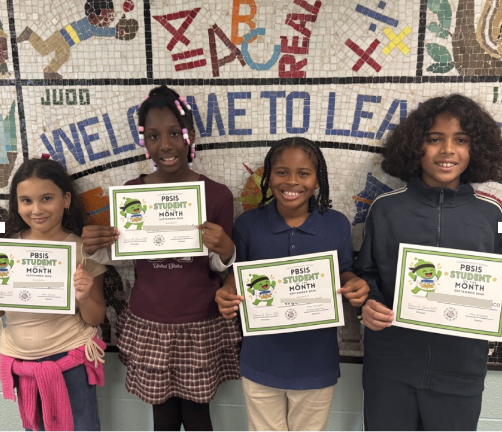Students holding certificates