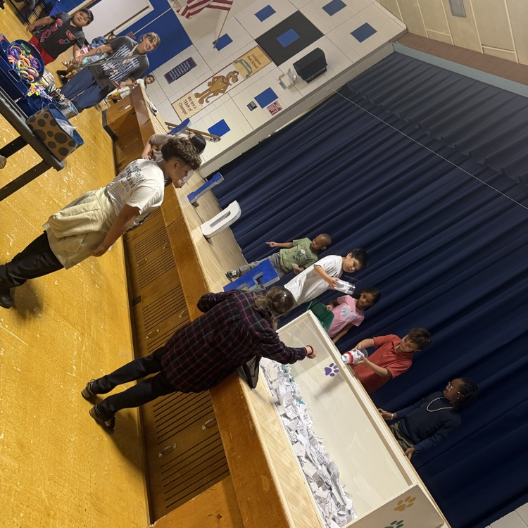 Students handing in their tickets 