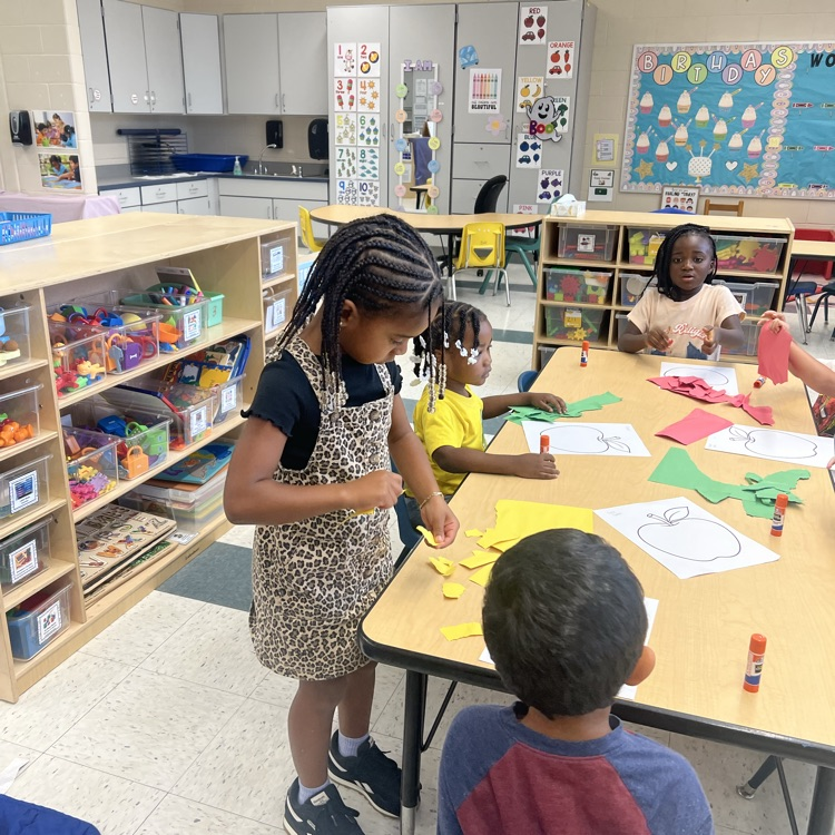 students working apple craft
