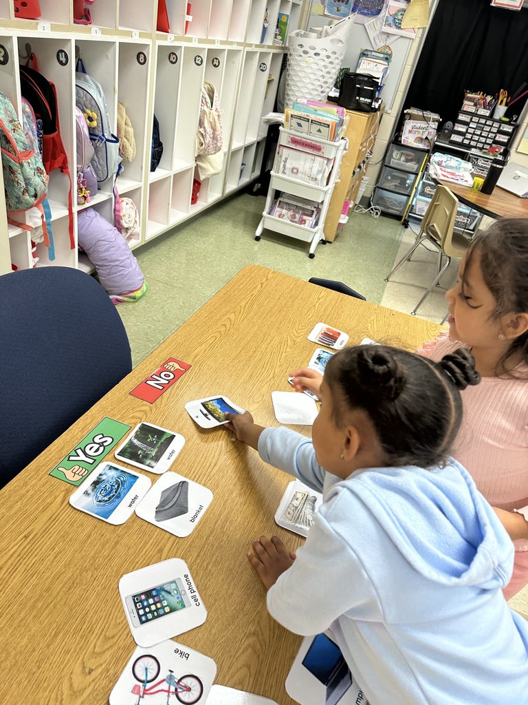 Students working in workstations.