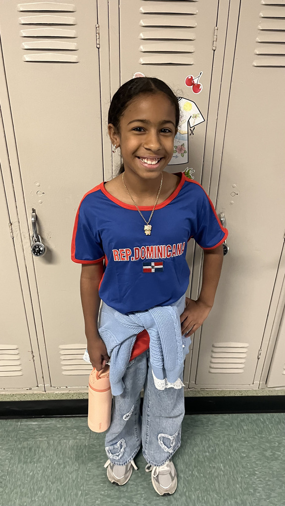 Student standing near lockers