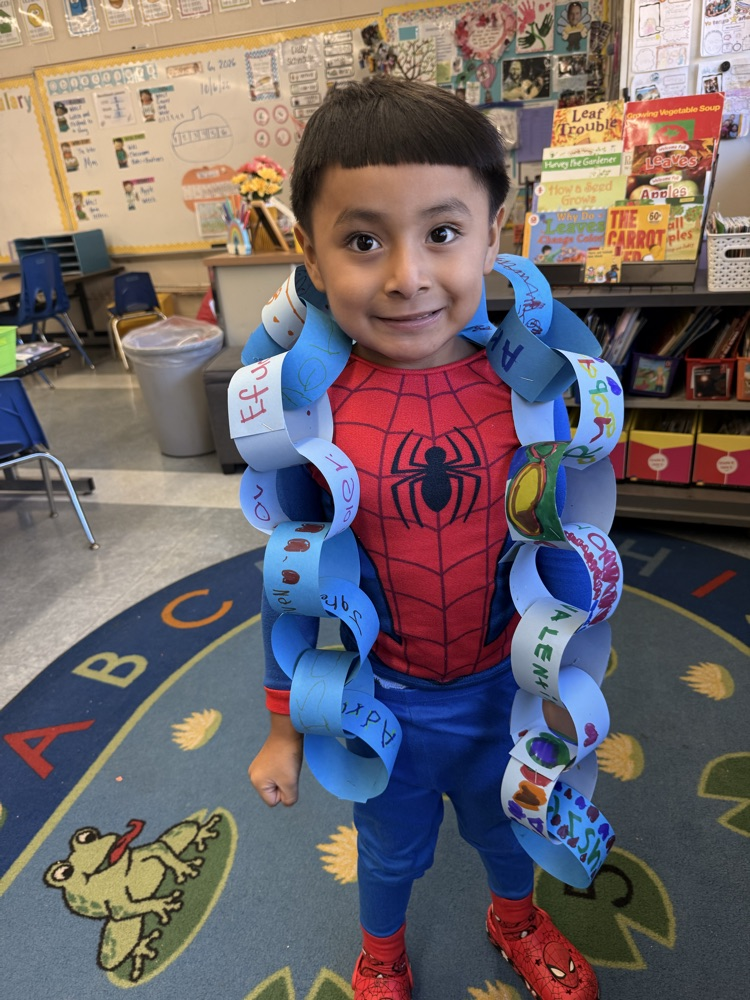Student holding Respect Chain