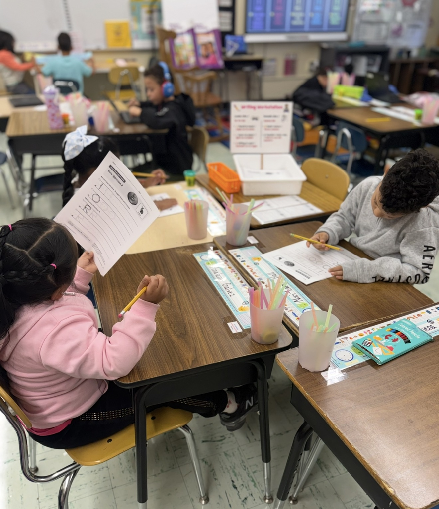 Students working in workstations.