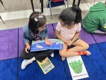 Students reading together