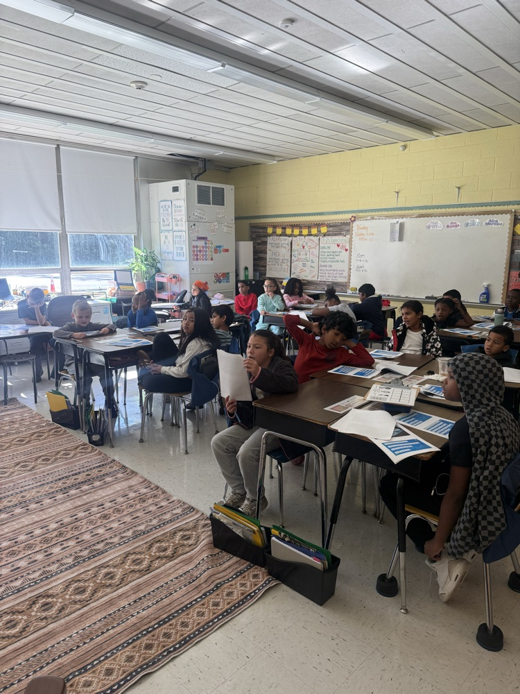 Students sitting in desks 