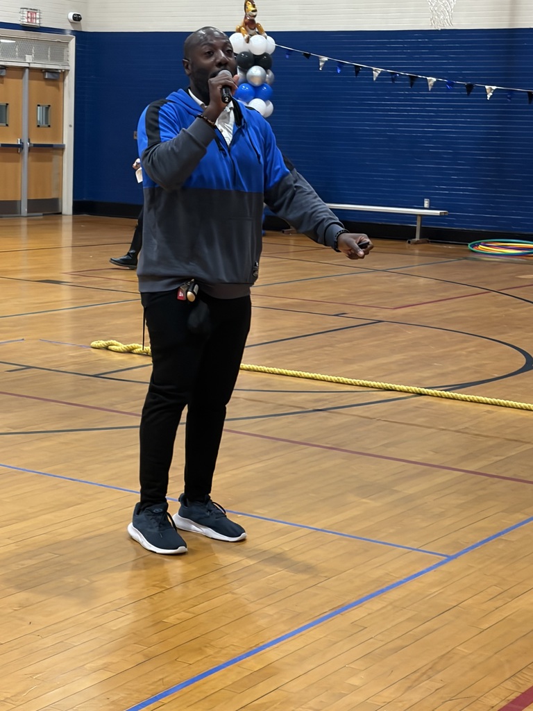 Staff member talking into microphone