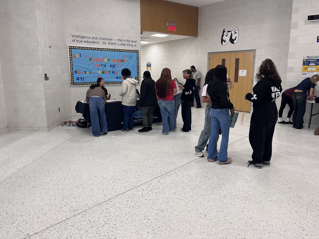 Students visiting booth in school