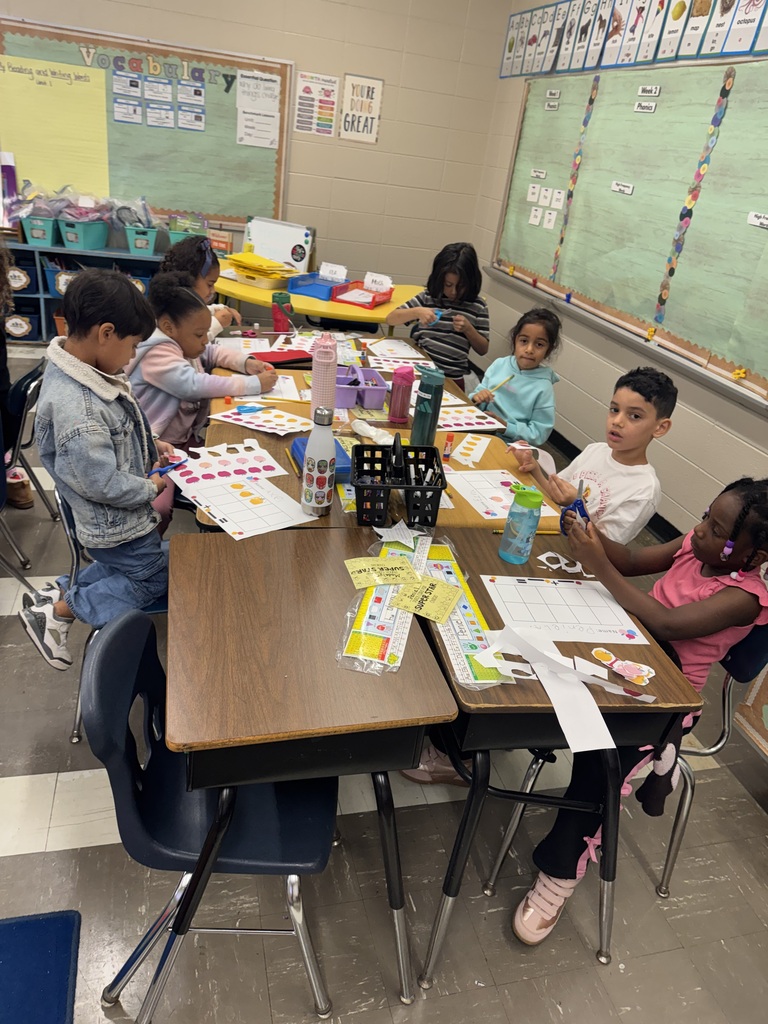 Students cutting and using ten frames