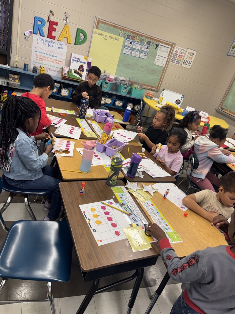 Students cutting and using ten frames
