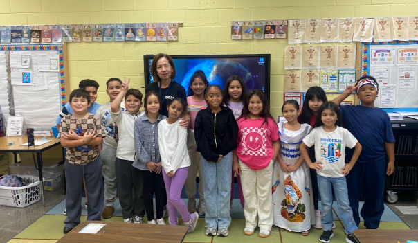 Students/staff posing together for Hispanic Heritage Month at LP