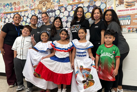 Students/staff posing together for Hispanic Heritage Month at LP