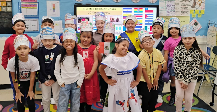 Students/staff posing together for Hispanic Heritage Month at LP