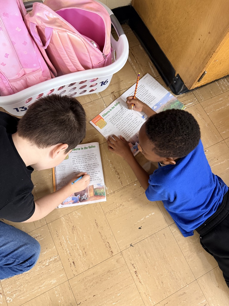 Ms. Marin's Class enjoying Benchmark and learning about habitats!