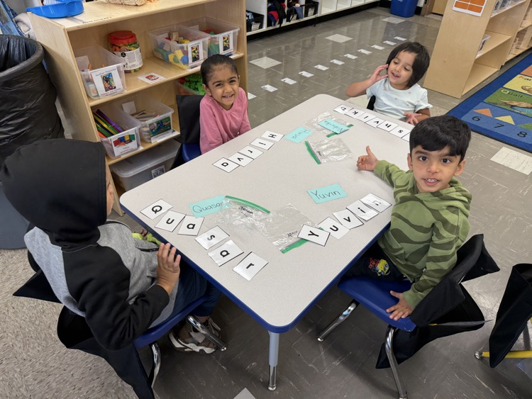 Students practicing the letters of their first name