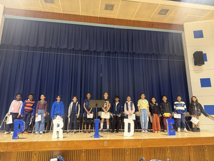 Students standing on stage 