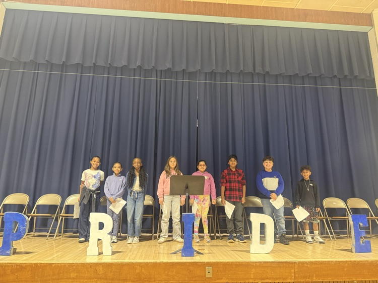 Students standing on stage 