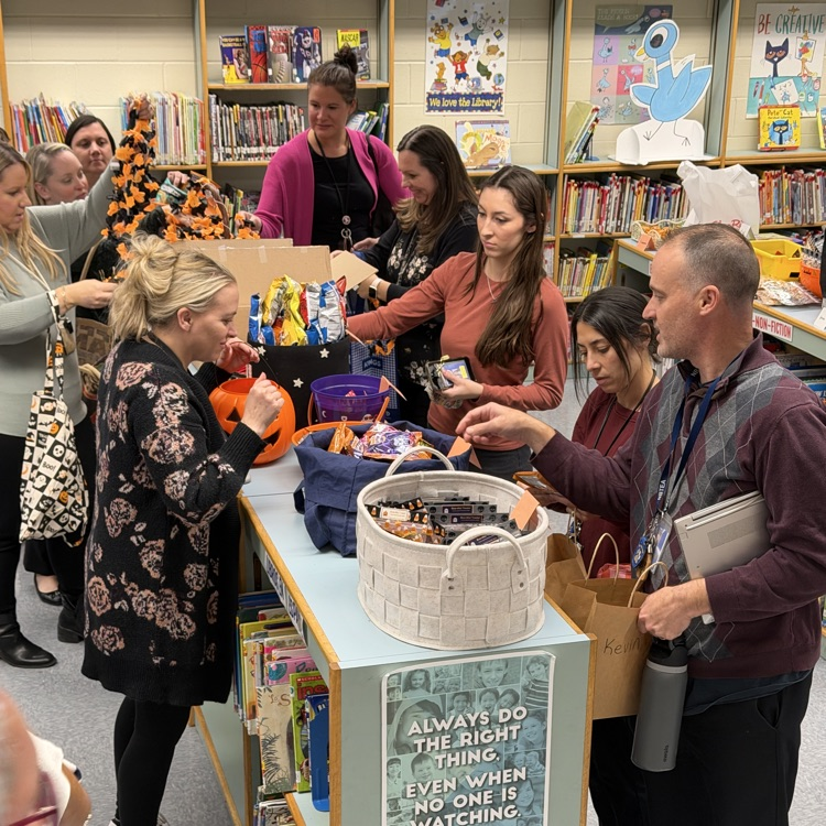 Staff participating in a trick or treat event