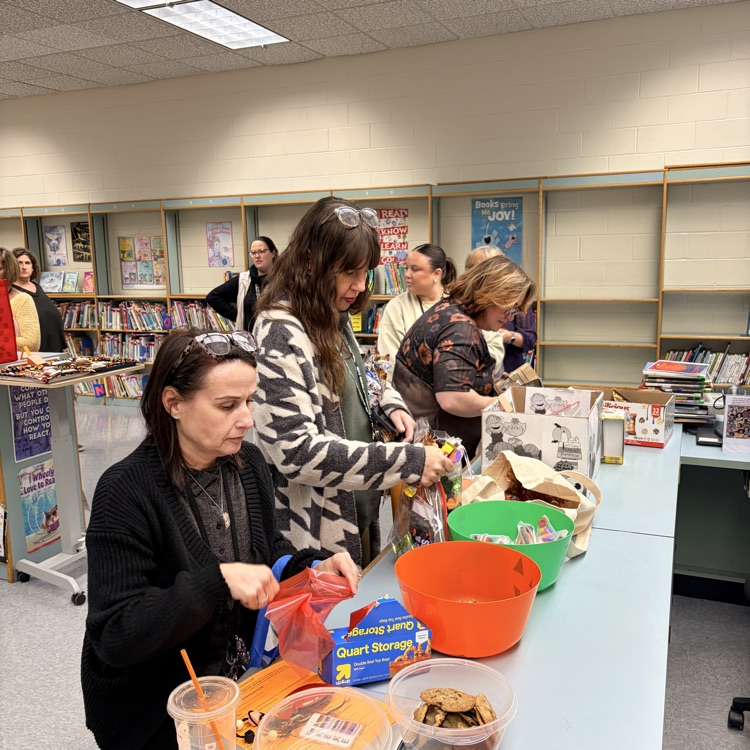 Staff participating in a trick or treat event