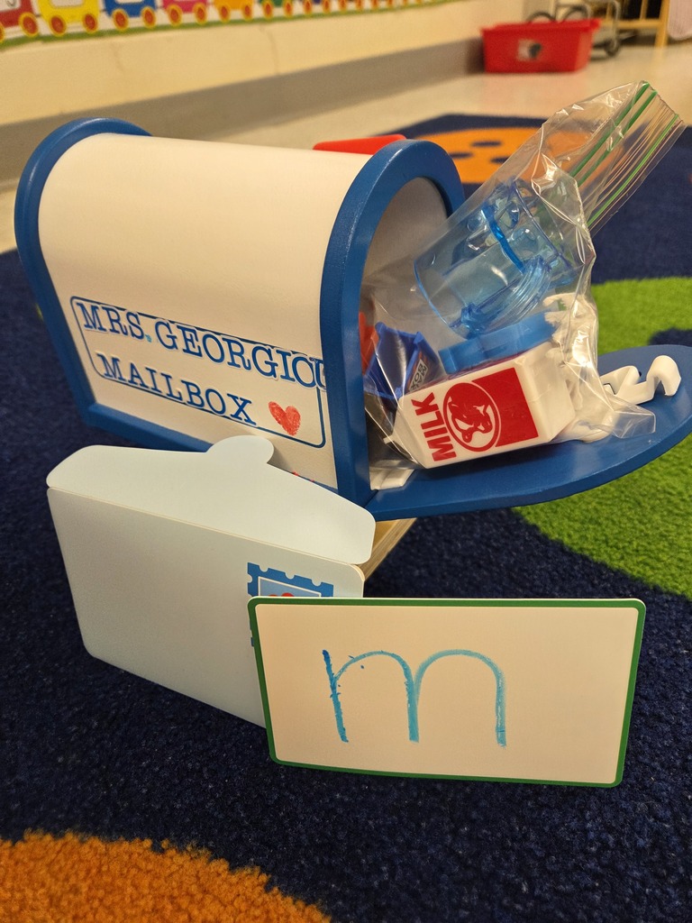 Mailbox stuffed with letter M items