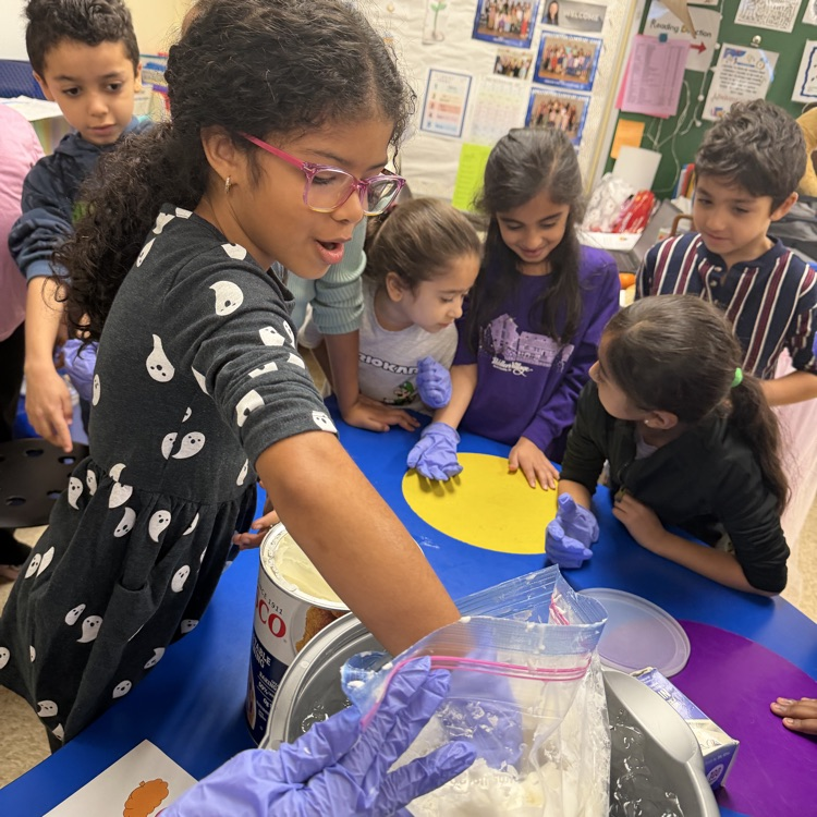 students participating in a science experiment 