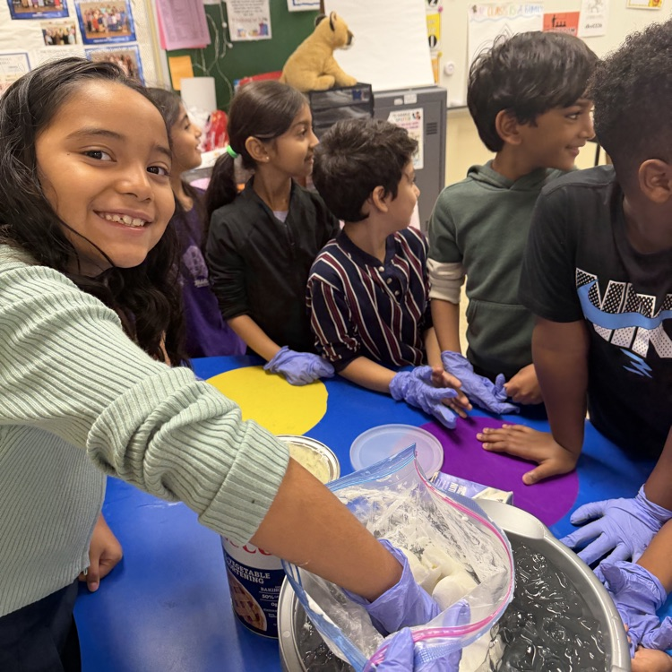 students participating in a science experiment 