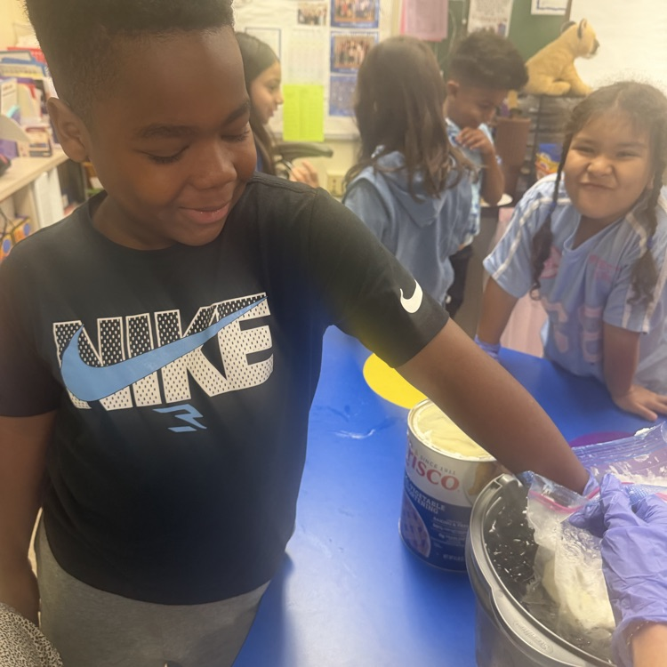 students participating in a science experiment 