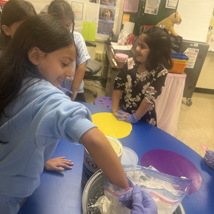 students participating in a science experiment 