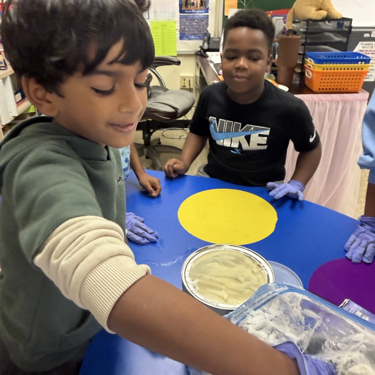 students participating in a science experiment 