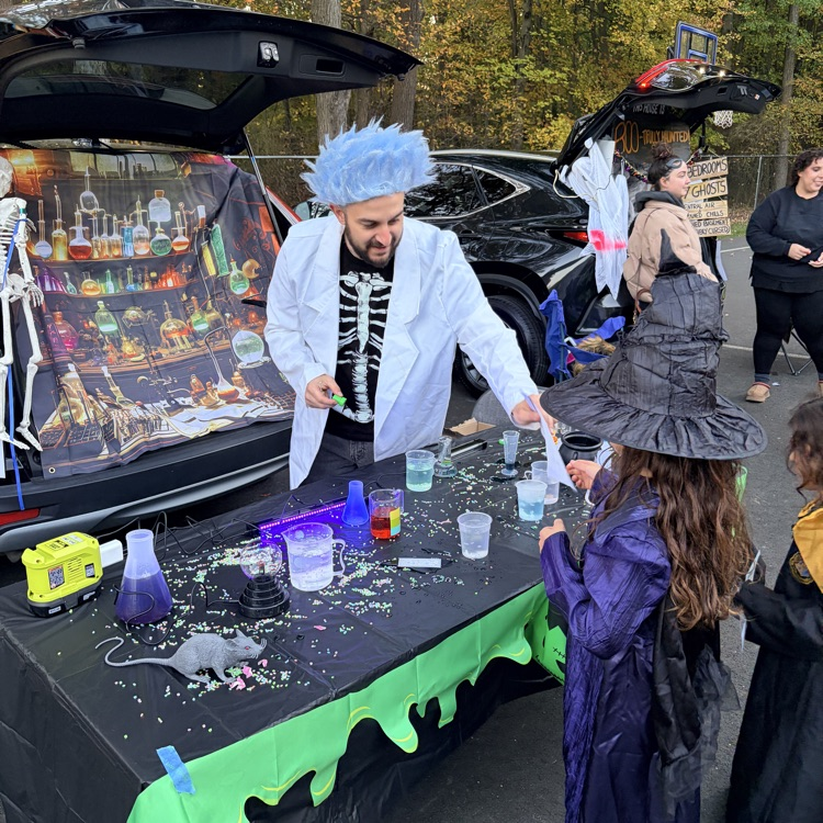 students at a trunk or treat event
