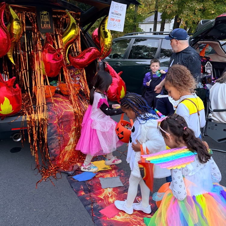 students at a trunk or treat event