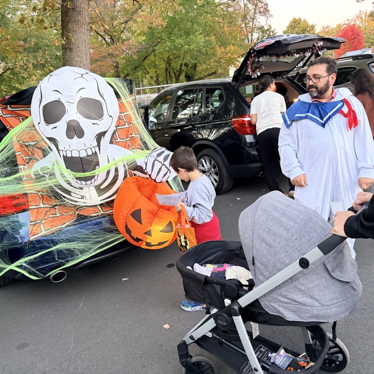 students at a trunk or treat event